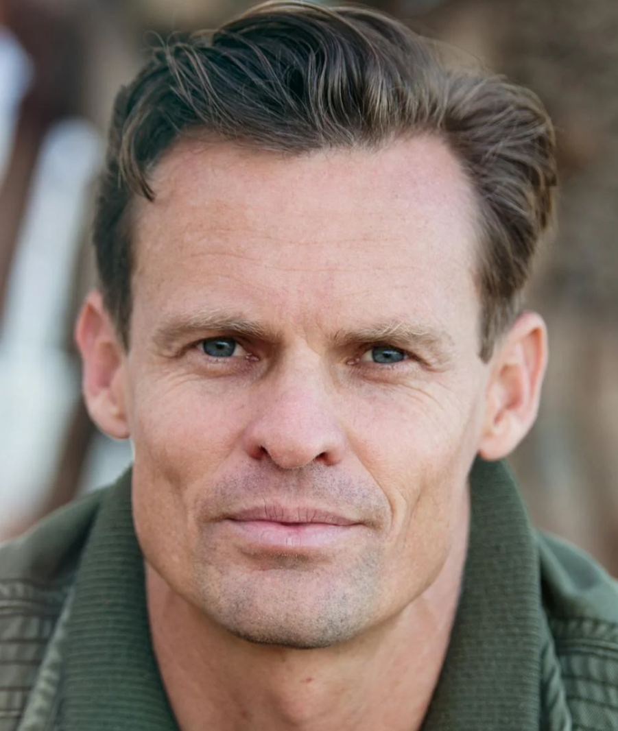 Nolan E.